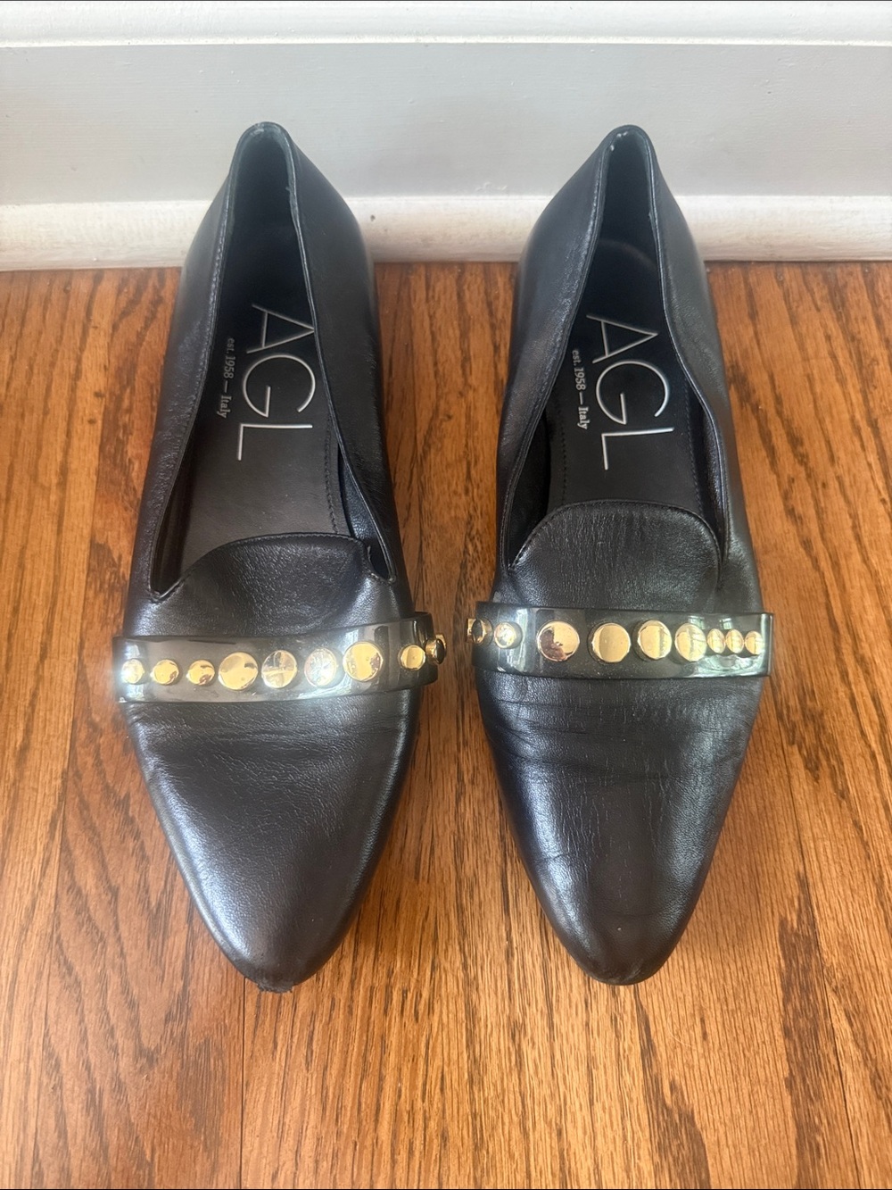 AGL Black Leather Pointed Loafers with Gold Studded Strap